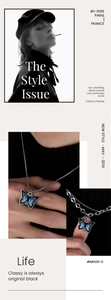 Detail of blue flame butterfly pendant with black enamel finish on double metal chains