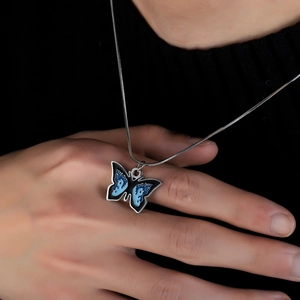 Blue flame butterfly pendant necklace in titanium steel for a trendy streetwear style