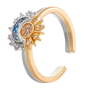 Adjustable sun and moon open ring with blue crystal moon and gold sun details