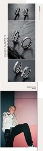 Macro detail of retro titanium steel hoop earrings with engraved cross patterns for men