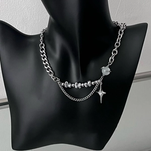 Silver star pendant necklace with cat eye stone on stainless steel layered chains