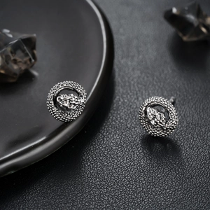 Retro snake stud earrings in silver finish with gothic textured ring design for men and women