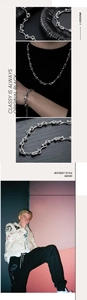 Close-up of interlocking silver bead and wave link chain necklace and bracelet set