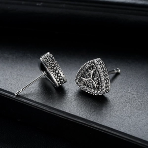 Retro triangle stud earrings with black crystals and tree texture in silver finish