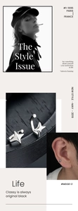 Detailed view of minimalist four-pointed star silver ear cuffs with matte metallic finish