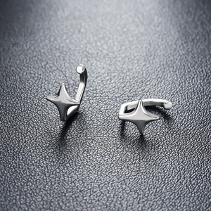 Minimalist silver star ear bone clips with polished metallic luster for men and women