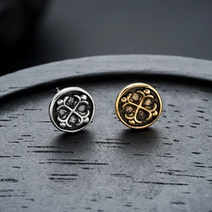 Boucles d'oreilles vintage avec relief en croix en finition or et argent mat