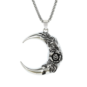 Vintage crescent moon pendant necklace with rose engraving and silver-tone chain link