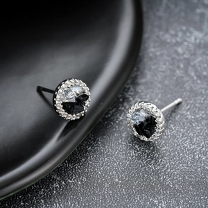 Runde Iced-Out-Ohrstecker mit schwarz-weißer Kristalleinlage für Damen und Herren im Design