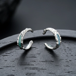 Artistic mint green irregular molten texture ear cuffs for non-pierced ears