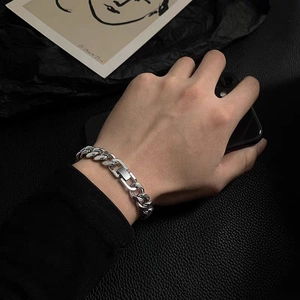 Men's silver titanium steel Cuban chain bracelet in a minimalist hip-hop streetwear style