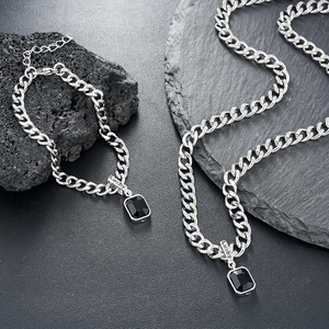 Silver curb chain necklace and bracelet set with black rectangular lucky pendant