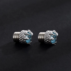 Maldives blue magnetic dragon claw earrings set in silver metal with gemstone