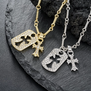 Kreuzanhänger Halskette in Gold und Silber mit funkelndem Strasssteinbesatz für Damen