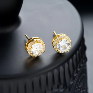 Luxurious gold round stud earrings with full diamond pavé and large central zircon stone