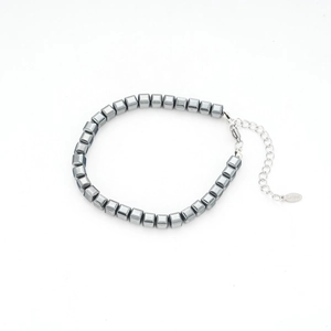 Bracelet minimaliste en perles d'hématite grise avec fermoir en acier inoxydable