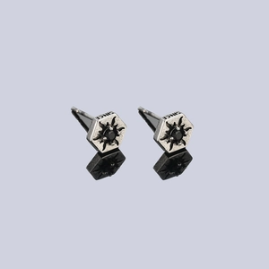 Hexagonal sunburst stud earring in silver metal with center black stone and side engraving