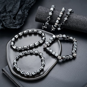 Men's magnetic hematite bead bracelet set with polished black geometric stones and silver accents