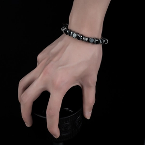 Men's hematite beaded bracelet with hexagon hematite stones and silver cylinder bead