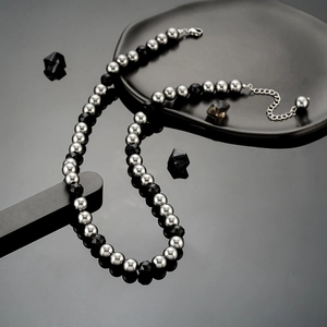 Geometric black pearl necklace with silver steel beads and adjustable lobster clasp