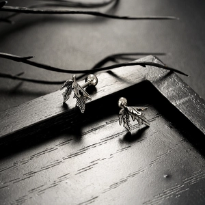 Silver maple leaf stud earrings with screw ball back in vintage punk style for men and women