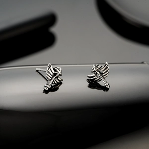 Retro angel wing and sword stud earrings in stainless steel with a vintage punk design
