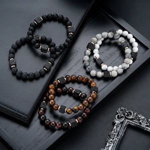 Men's natural matte lava and tiger eye beaded bracelets with elegant golden spacers