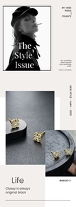 Detail of vintage hollowed-out golden cross studs with intricate baroque patterns