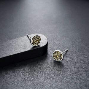 Vintage round mandala stud earrings with black and gold patterns for men and women