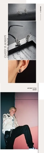 Detailed view of vintage feather stud earrings with engraved textures and street style look