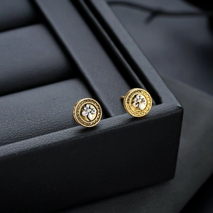 Vintage floral button stud earrings in antique gold and silver punk style design