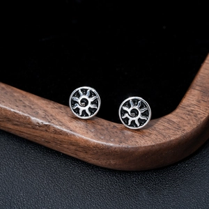 Vintage sun pattern stud earrings in silver steel with black enamel inlay design