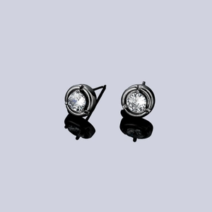 Unisex black plated stud earrings featuring round cubic zirconia and minimalist design