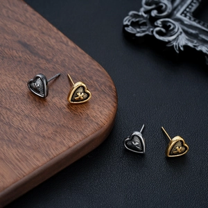 Vintage heart stud earrings with cross relief in antique gold and gunmetal finishes