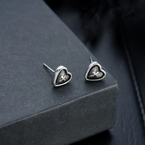 Retro heart stud earrings with engraved cross detail in vintage silver finish