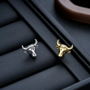 Retro bull head magnetic ear clips for men in gold and silver finish with detailed carvings