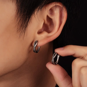 Vintage stainless steel hoop earrings with half-twisted woven texture and smooth finish