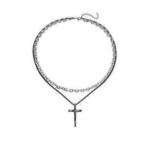 Double-layered silver and black chain necklace featuring a geometric cross pendant
