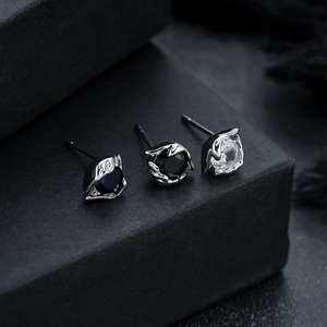 Three-piece set of evil eye stud earrings with blue, black and white cubic zirconia stones