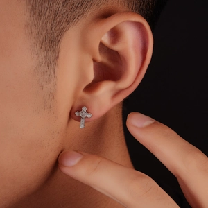 Silver heart cross stud earrings with zircon inlay and micro-pave crystals on earlobe