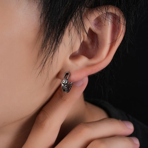 Vintage oxidized silver cat hoop earrings with intricate gothic engraved details
