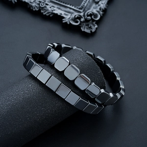 Men's polished black hematite beaded bracelet set with square and rectangular stones