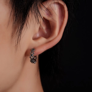 Boucles d'oreilles étoile en chaîne argentée au design industriel et vintage
