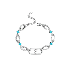 Bracelet à maillons argentés martelés avec cristaux bleus et pendentif lettre S évidée
