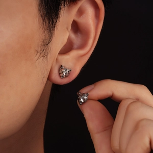Retro tiger head stud earrings in antique silver finish for a bold unisex jewelry style