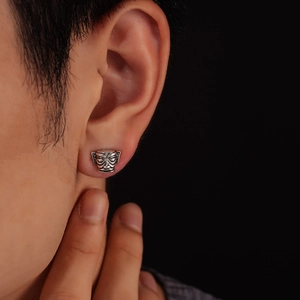 Retro Sanxingdui mask stud earring in antique silver finish for a vintage ethnic look