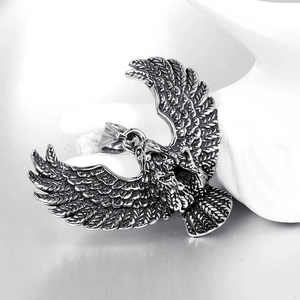 Vintage stainless steel eagle pendant with detailed wings and silver punk finish