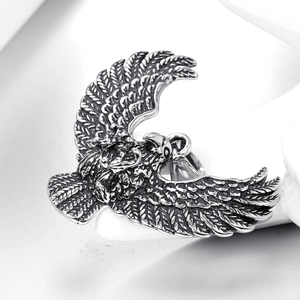 Vintage stainless steel eagle pendant with detailed feather textures in punk style