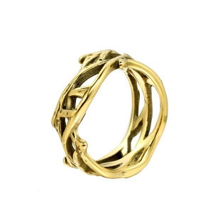 Minimalist golden thorn vine ring in stainless steel shown from a side angle