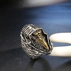 Retro gothic plague doctor skull ring for men with gold beak and silver steel finish